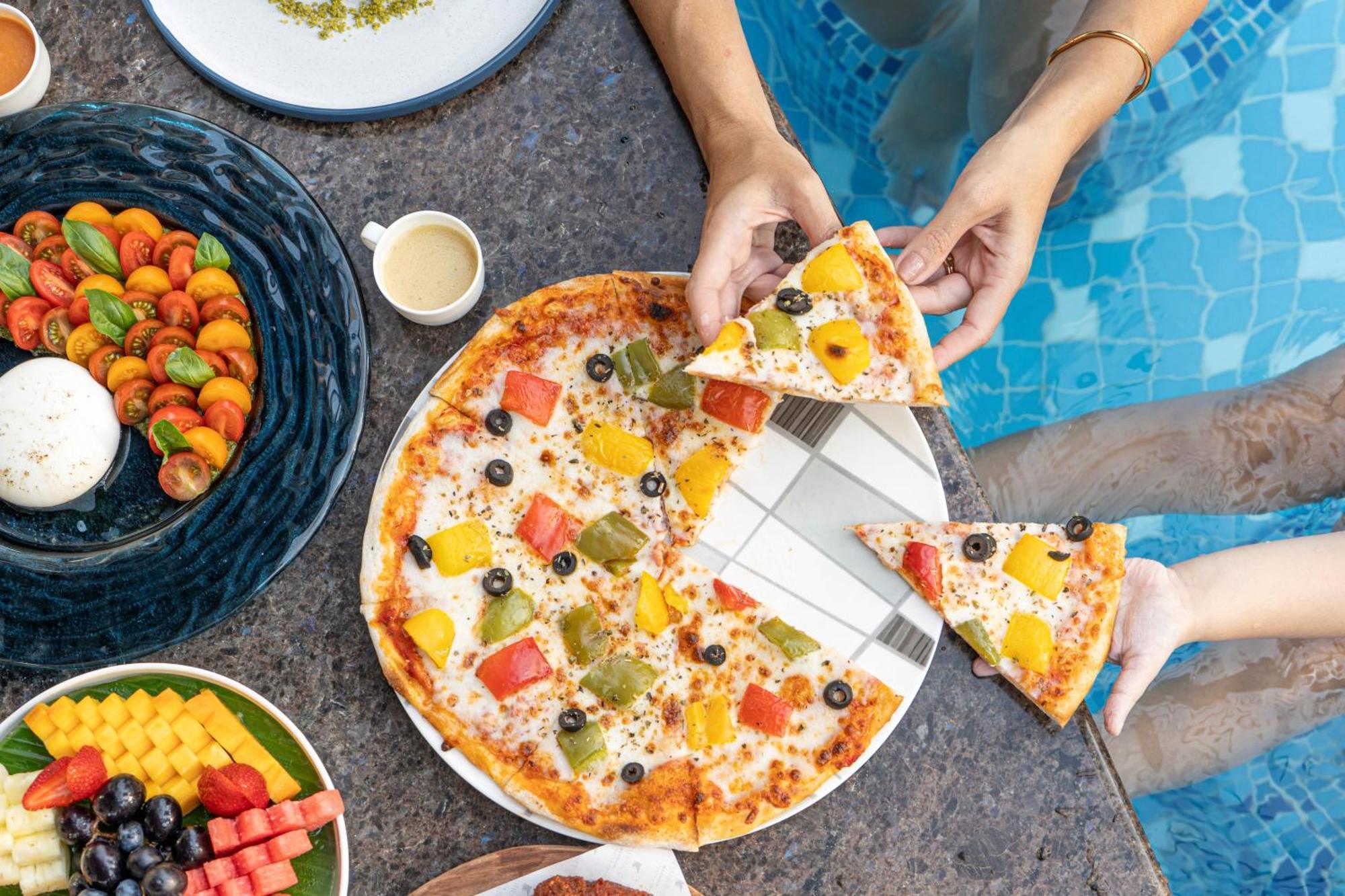 Jw Marriott Marquis City Center Doha Buitenkant foto Pizza