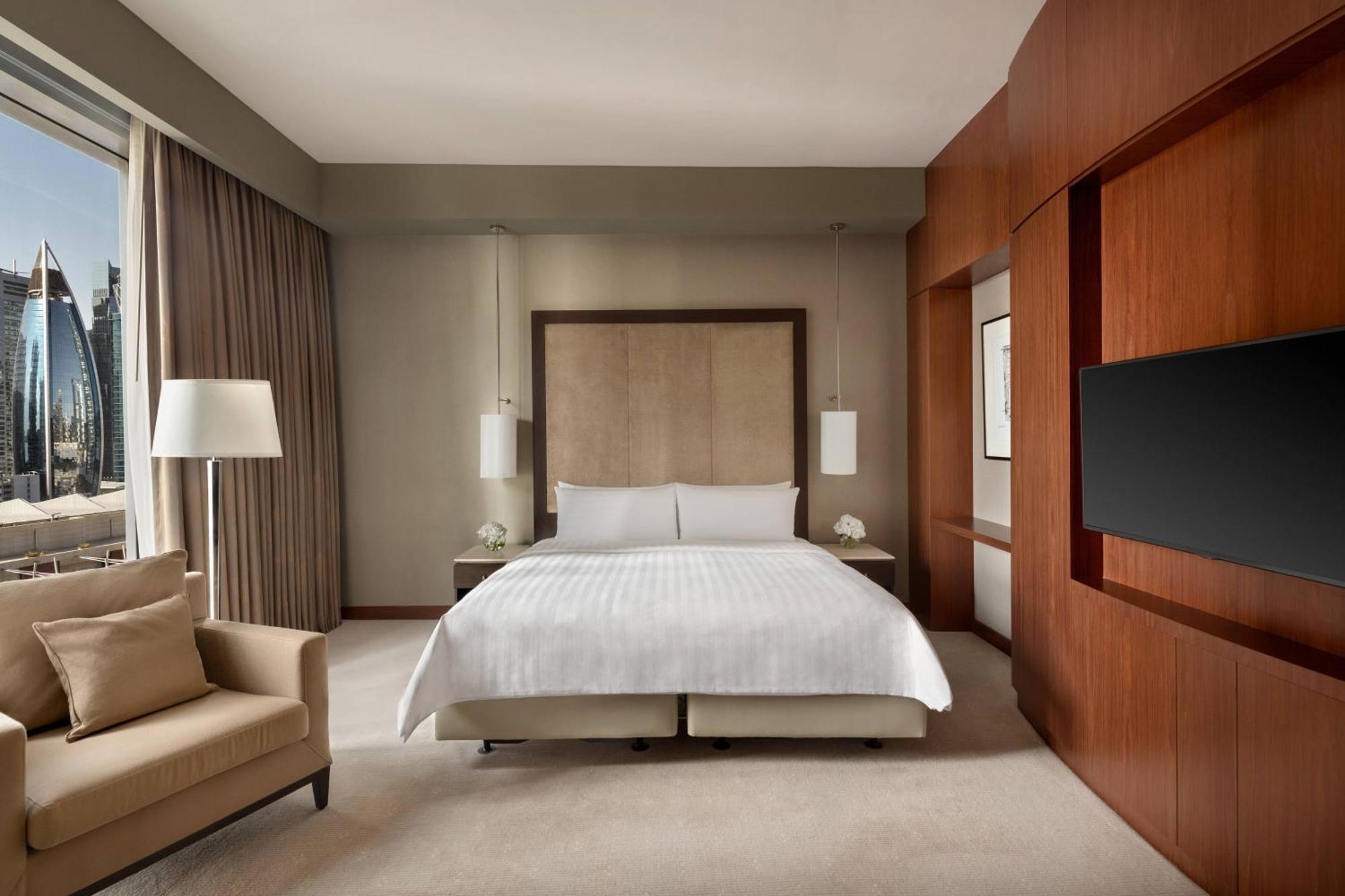 Jw Marriott Marquis City Center Doha Buitenkant foto A bedroom at the Ritz-Carlton, DIFC